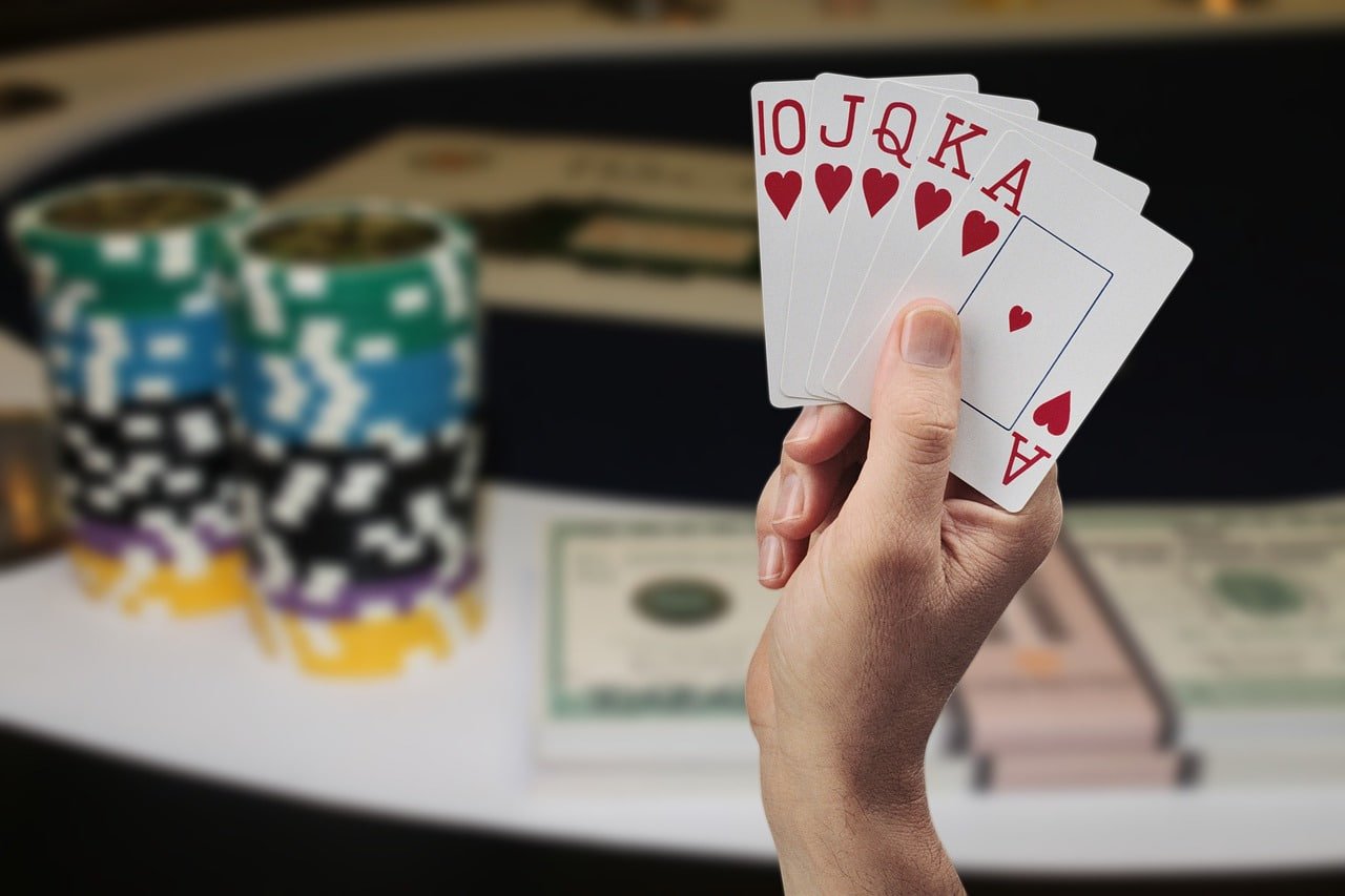 okjp login mobile app showing poker table lobby with tournament schedule and available ring games